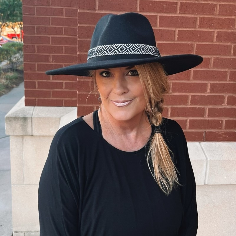Brenda Vien wearing a black hat